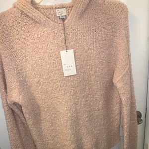light pink sweater